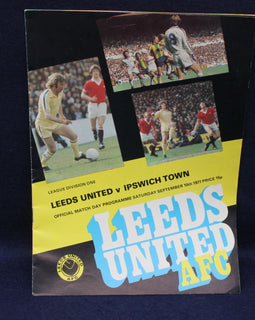 Vintage Leeds United AFC football match programme against Ipswich Town on a dark background
