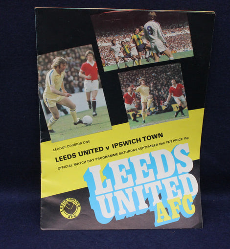Vintage Leeds United AFC football match programme against Ipswich Town on a dark background