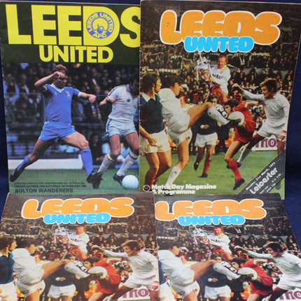 Four Leeds United football program covers from different matches.