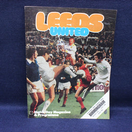 Leeds United match day magazine and programme cover with soccer players on a blue background