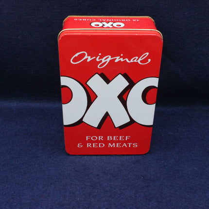 Red OXO tin for beef and red meats on a blue background