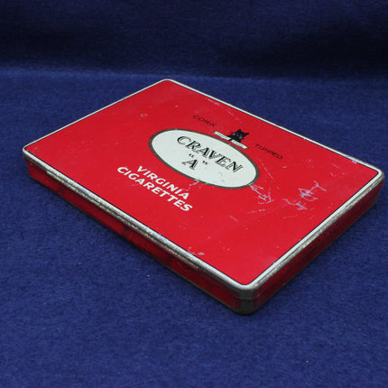 Red Craven A Virginia Cigarettes tin on a blue background