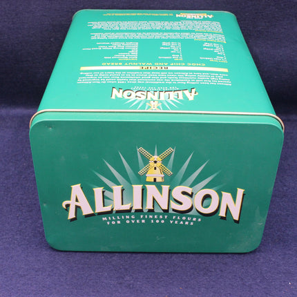 Green tin box with Allinson branding on a purple background