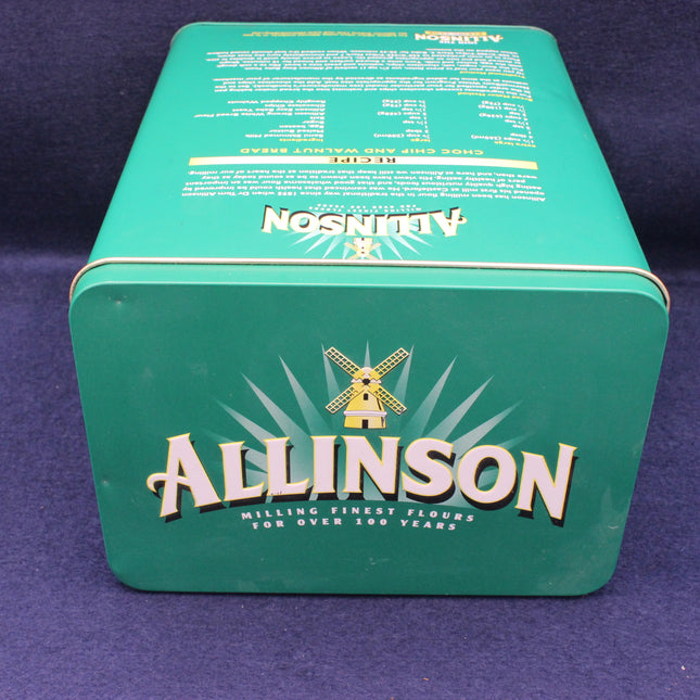 Green tin box with Allinson branding on a purple background