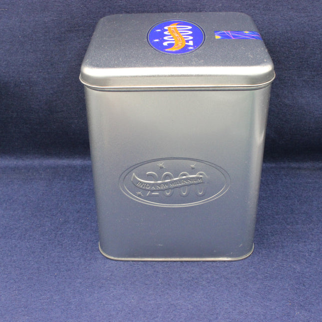 Silver metal tin with a logo on a blue background