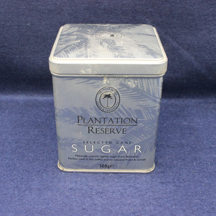 Plantation Reserve sugar tin on a blue background