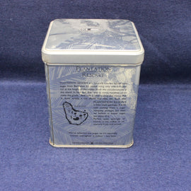 Plantation Reserve tin on a blue fabric background