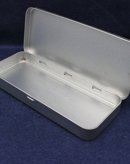 Metallic rectangular box with a lid on a dark blue background