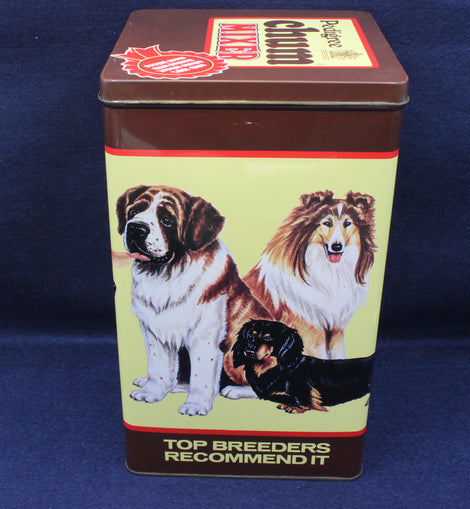 Dog-themed tin box with images of dogs on a blue background