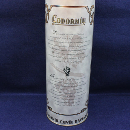Codorniu wine bottle label on a blue background