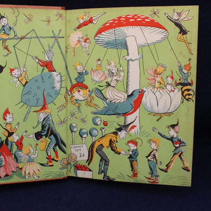Illustrated fairy tale scene with fairies, mushrooms, and other fantasy elements on a green background.