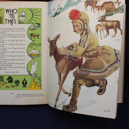 Open book with illustrations of a child and deer, and educational content on the left page.