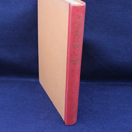 Red book spine on a blue background