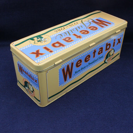 Vintage-style Weetabix cereal box on a dark blue background