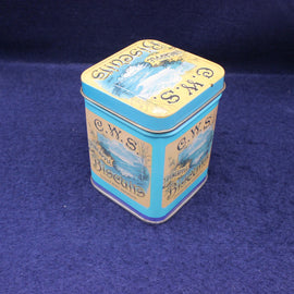 CWS Biscuits tin on a blue background