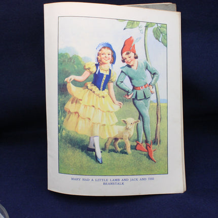 Illustration from a book showing two characters with a lamb on a blue background