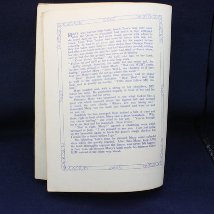 Open book with text on a dark blue background