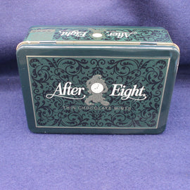 After Eight chocolate mints tin on a purple background