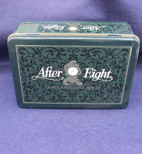 After Eight chocolate mints tin on a purple background