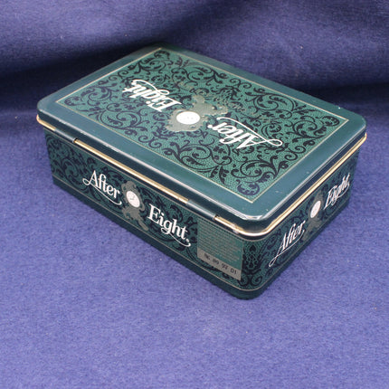 Green decorative box with 'After Eight' branding on a purple background