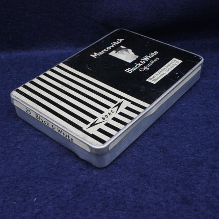 Cigarette pack with striped design and 'Marcovitch' branding on a blue background