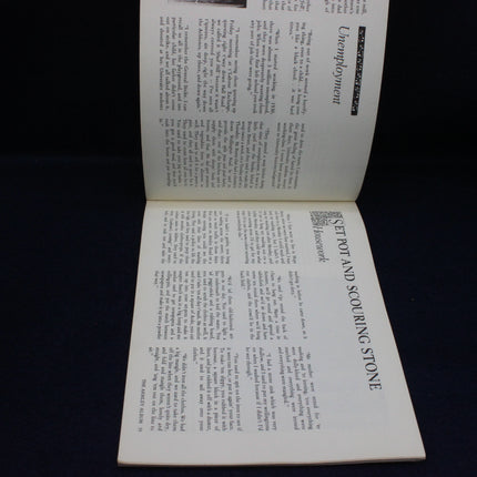 Open book with text on a black background