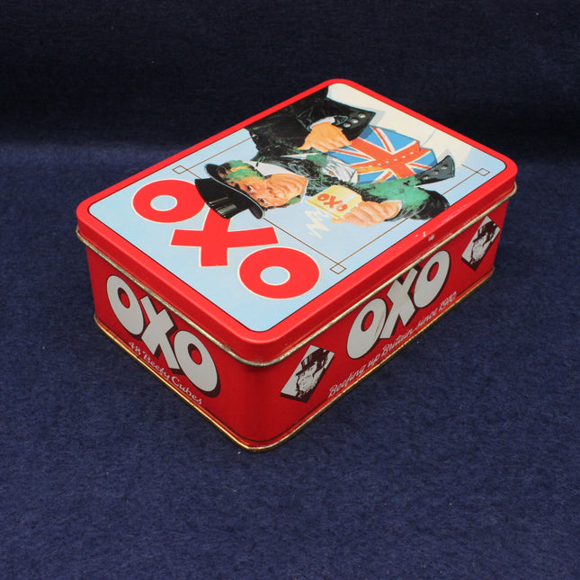 OXO vintage tin box with British flag design on a dark blue background