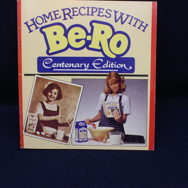 Cookbook titled 'Home Recipes with Be-Ro Centenary Edition' on a dark background