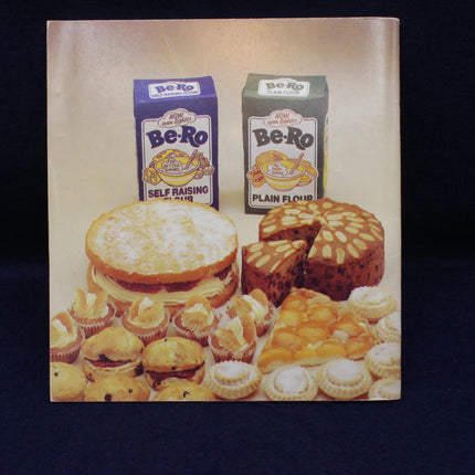 Advertisement for Be-Ro flour boxes with baked goods on a dark background