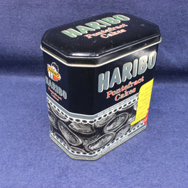 Haribo Ponteferret Cakes tin on a blue background