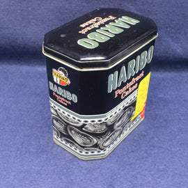 Haribo tin on a blue background