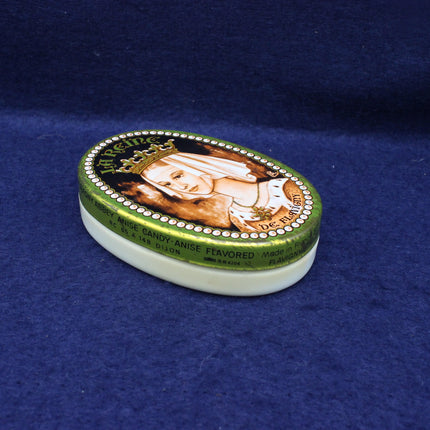 Vintage-style candy container with a portrait on a blue background