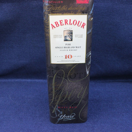 Aberlour whisky bottle on a blue background