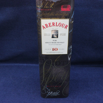 Aberlour whisky bottle on a blue background