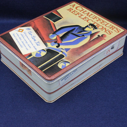 Decorative tin box with a chauffeur illustration on a blue background