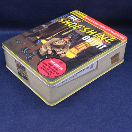 Shoeshine outfit tin box on a blue background