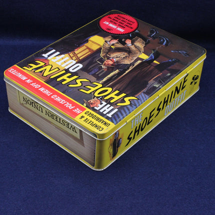 Vintage-style shoeshine kit box with graphics on a blue background
