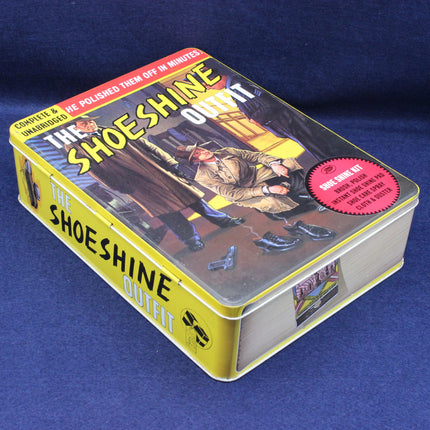 Shoeshine outfit tin box with vintage-style illustration on a blue background