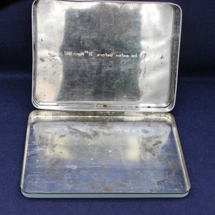 Worn metal case on a blue background