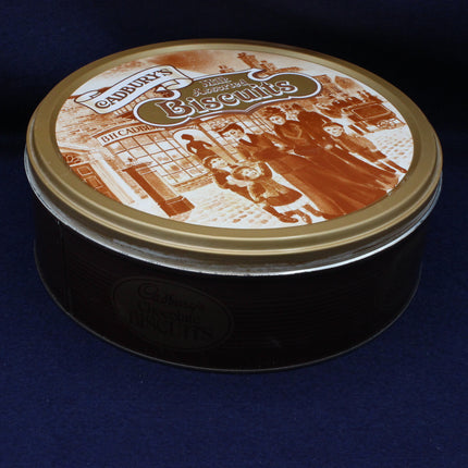 Chlldren and women image standing outside a Cadbury's sweet shop on a tin lid