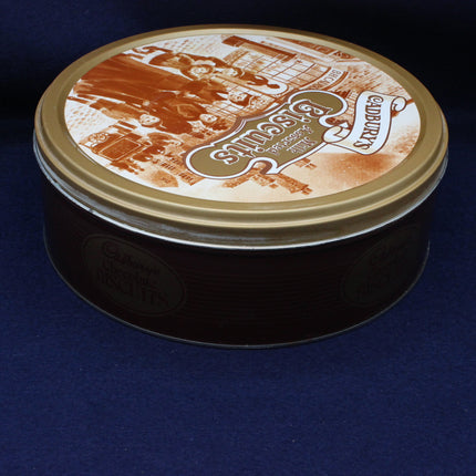 Round Biscuit tin with Cadburys branding