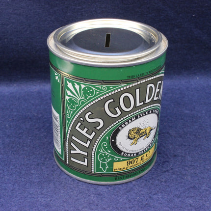 Lyle's golden syrup tin on blue background
