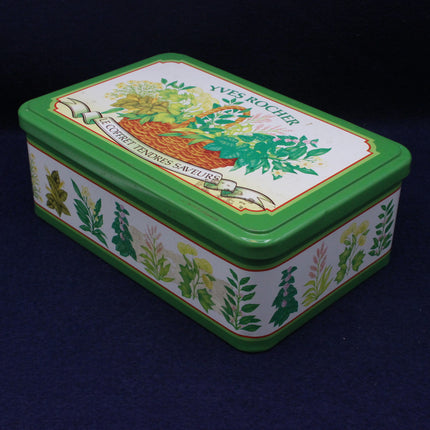 Yves Rocher tin box with herbal design on a dark background