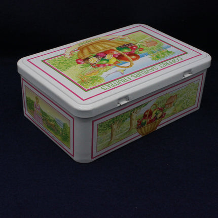 Baskets of fruit on a collectors tin