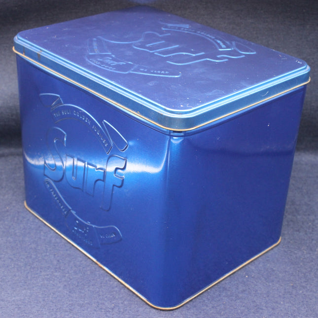 Blue Surf Collectors Tin on a dark blue background