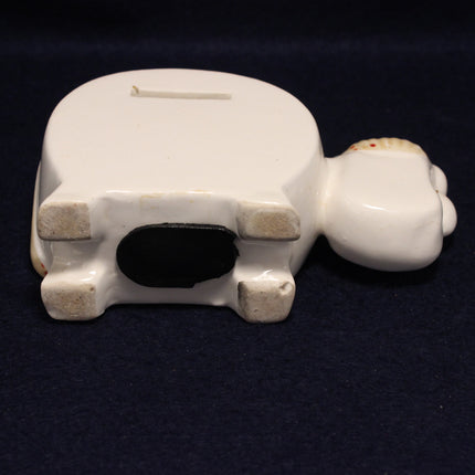 Bottom view of a cow money box