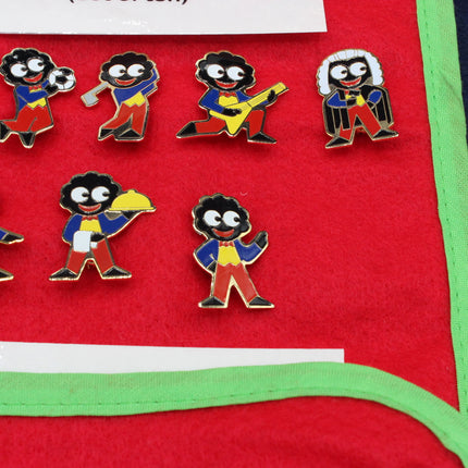 Robertsons Golly Badges on red background