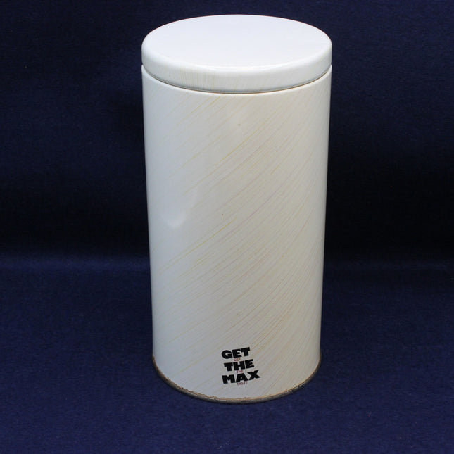 Angled shot of collectable Maxwell House tin highlighting retro advertising design.