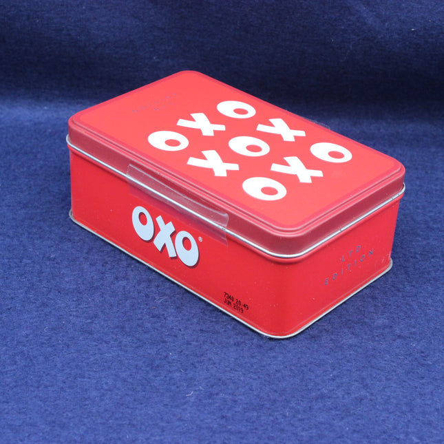 Angled shot of vintage Oxo tin showing collectable design and nostalgic kitchen style.