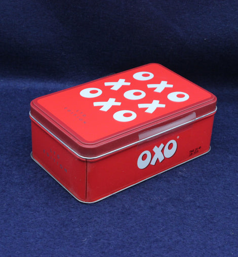 Front view of Oxo Cubes Limited Edition storage tin with bold red and white retro branding.
